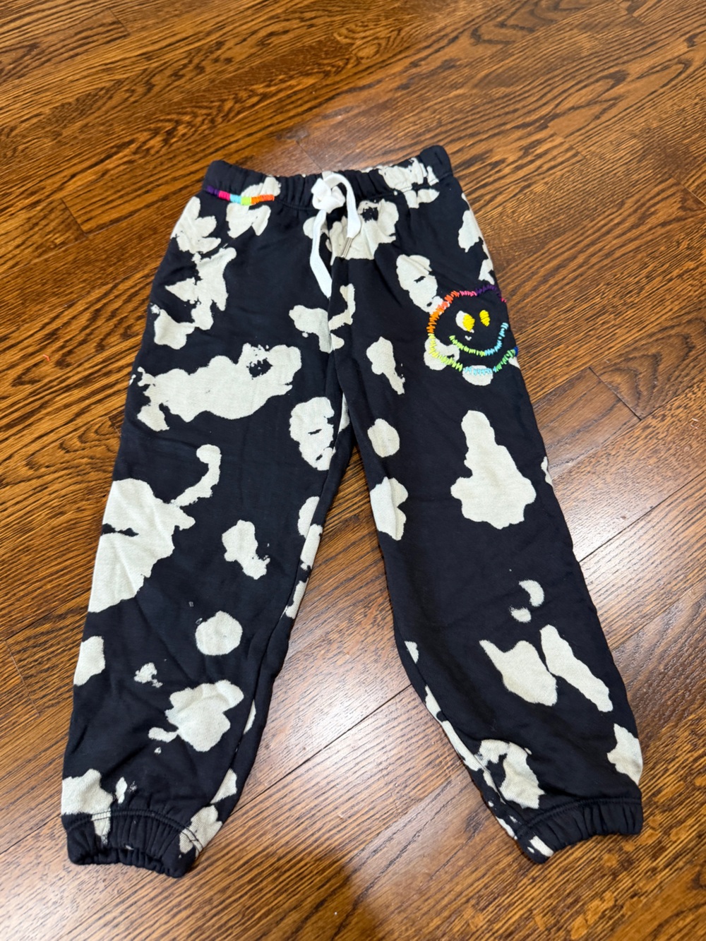 Flowers by Zoe. Black & Cream Print Jogger Pants with Rainbow Smiley, size 3T